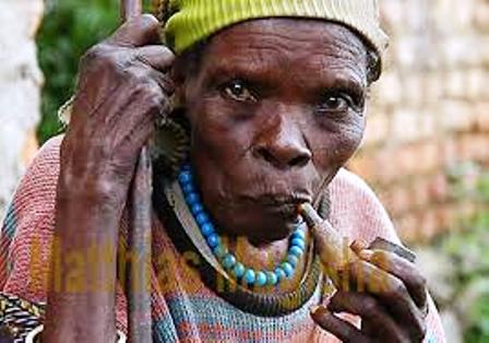 a mukiga woman smoking pipe