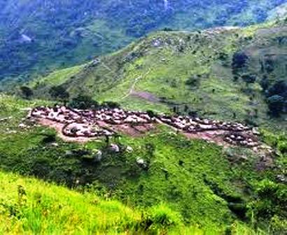 The homestead of the ik tribe patched on top of the mountain